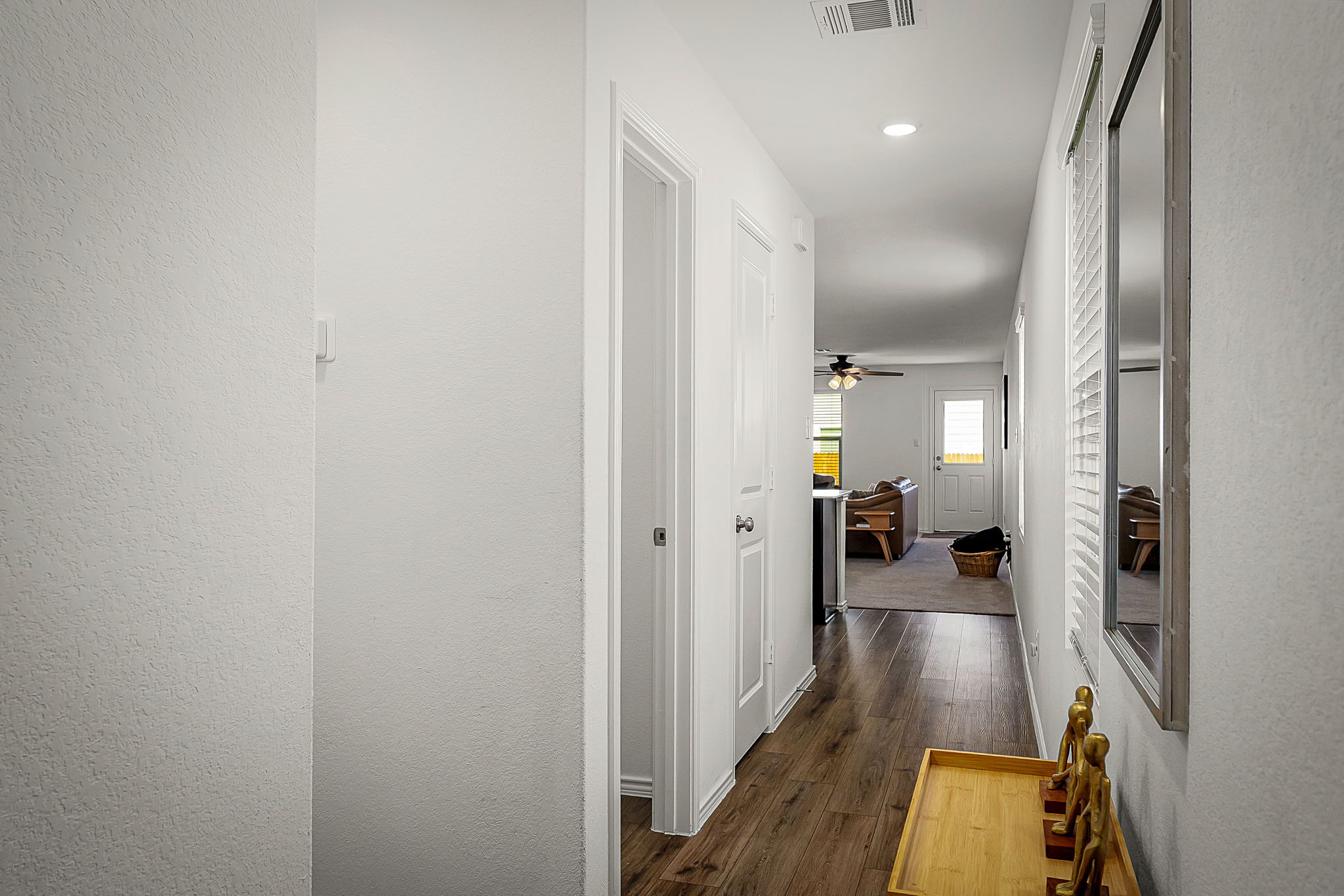 175 Amber Glen Maxwell, TX 78656 - Photo 17 of 27 a view of a hallway view with wooden floor and staircase