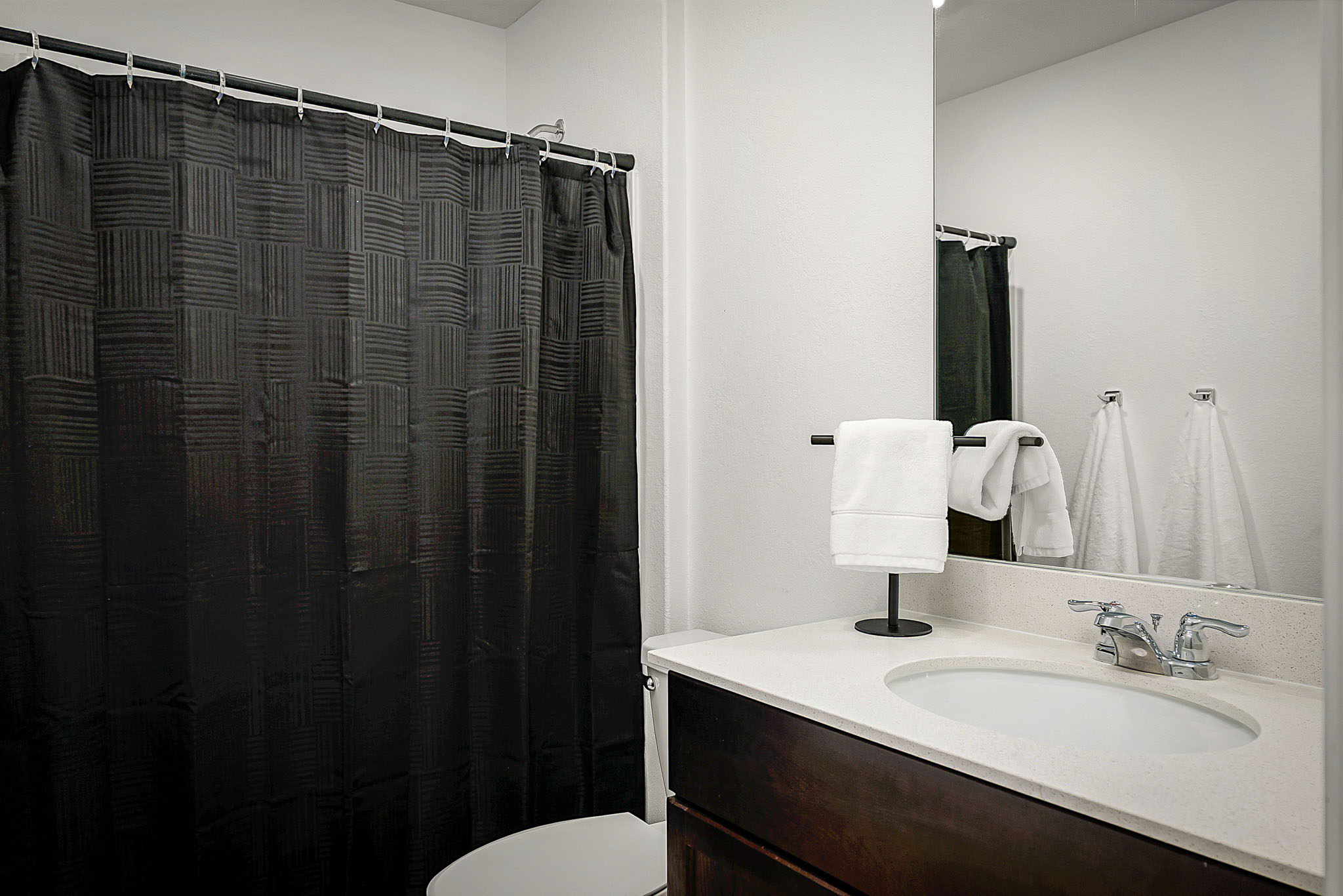 175 Amber Glen Maxwell, TX 78656 - Photo 21 of 27 a bathroom with a sink and a mirror