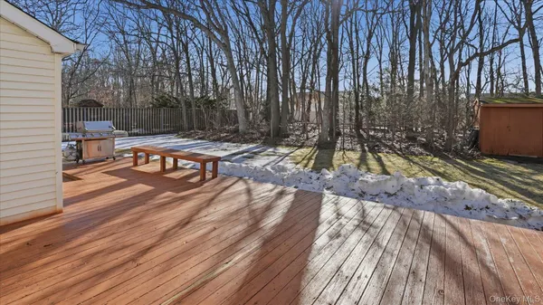 a view of a backyard with sitting area