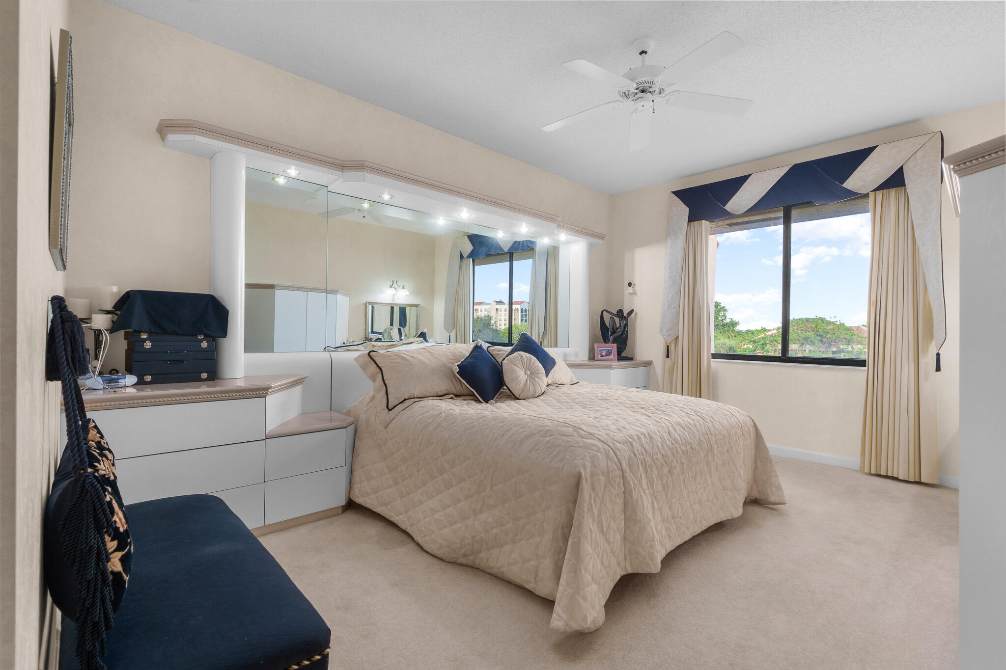 7546 La Paz Boulevard, Unit 405 Boca Raton, FL 33433 - Photo 15 of 43 a bed room with a bed and a large window