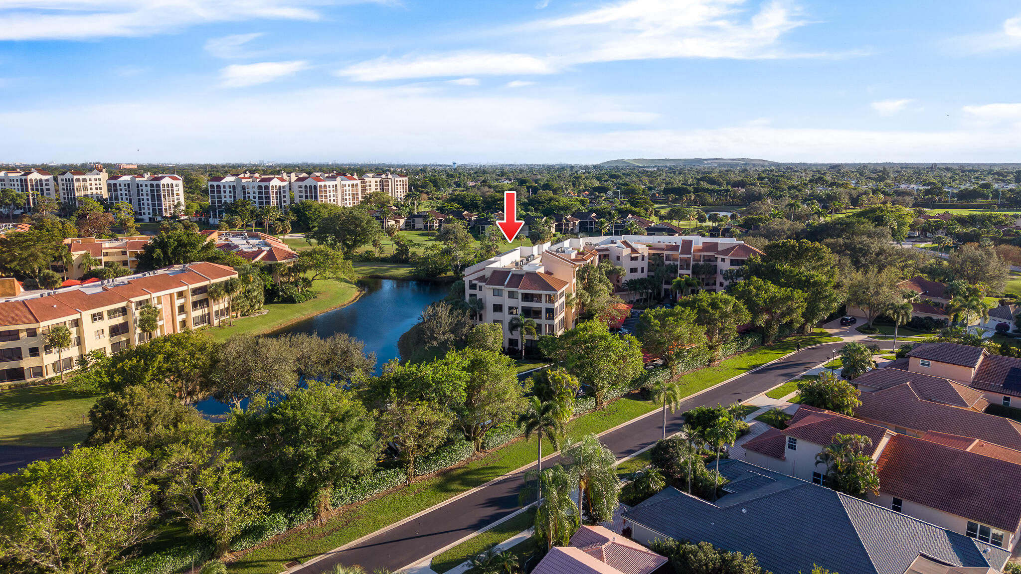 7546 La Paz Boulevard, Unit 405 Boca Raton, FL 33433 - Photo 37 of 43 an aerial view of a city