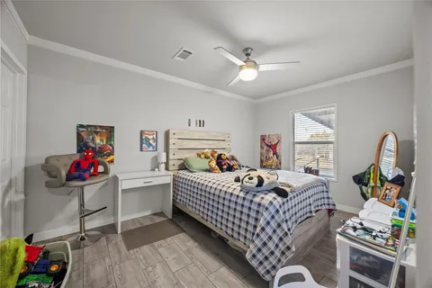 a bedroom with furniture a bed and a dresser