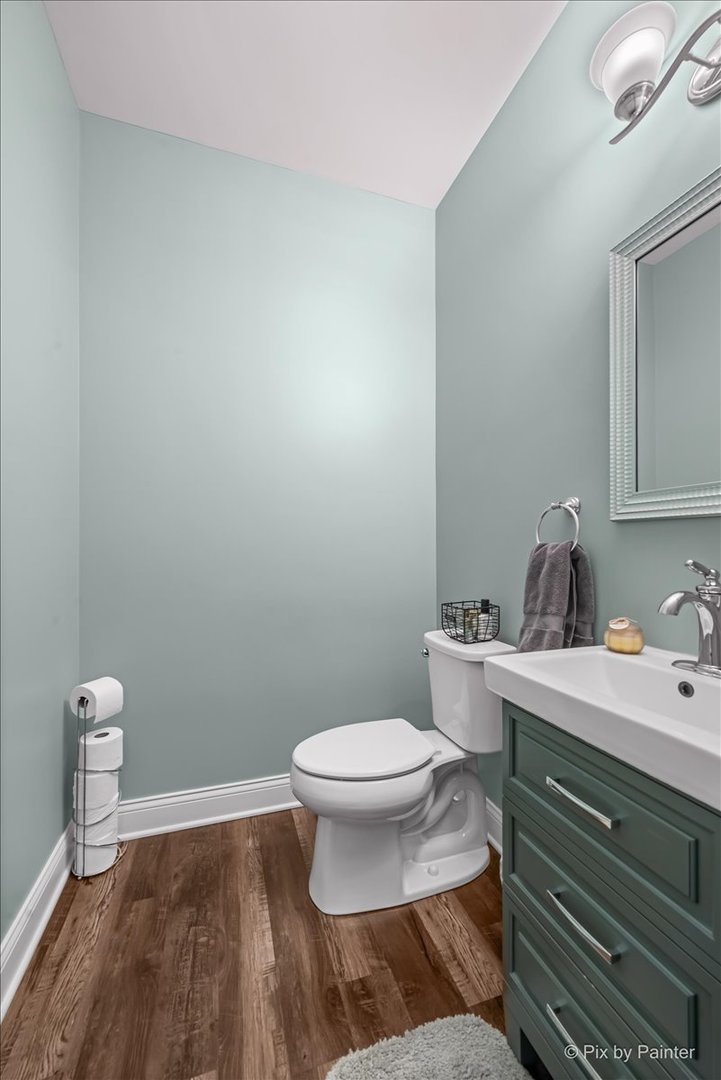 745 Harper Avenue Cary, IL 60013 - Photo 17 of 32 a bathroom with a toilet and a sink