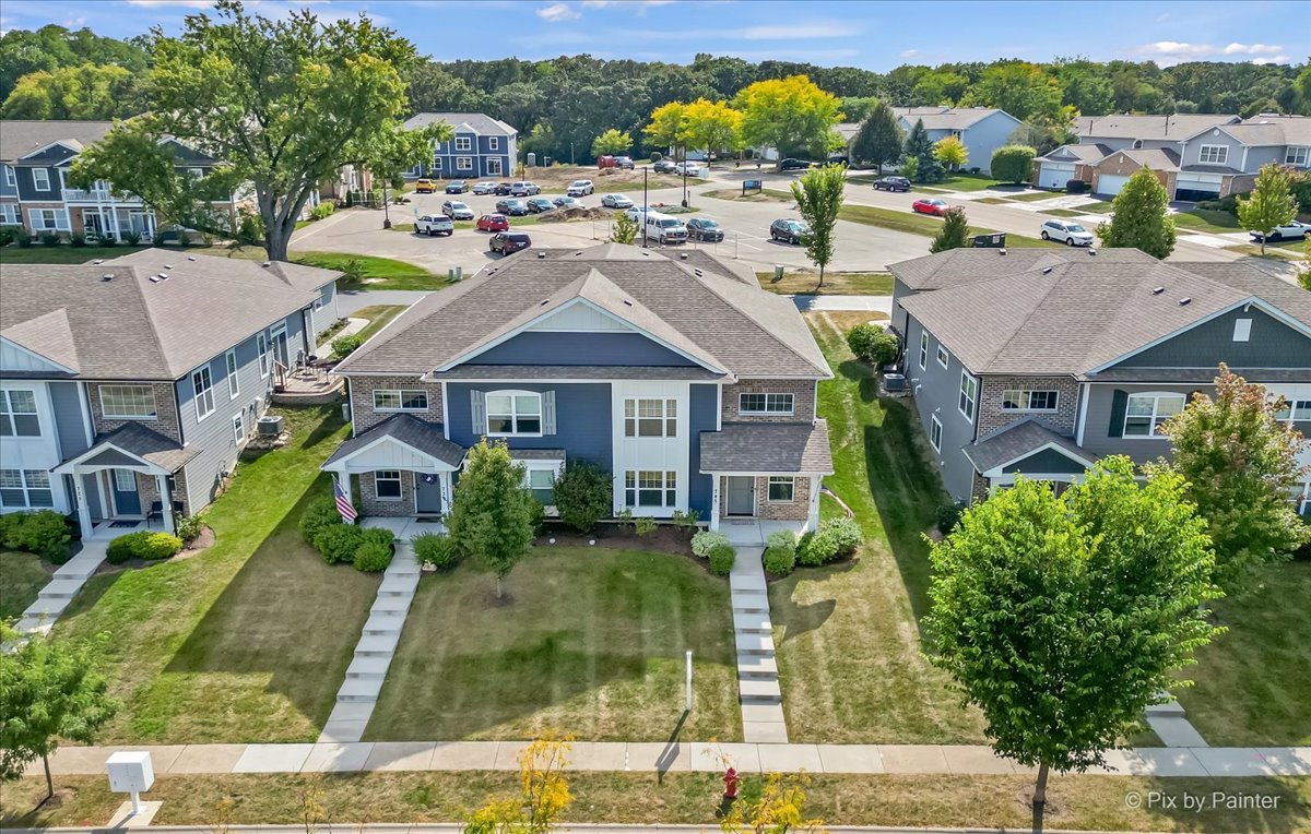 745 Harper Avenue Cary, IL 60013 - Photo 30 of 32 a aerial view of residential houses and outdoor space