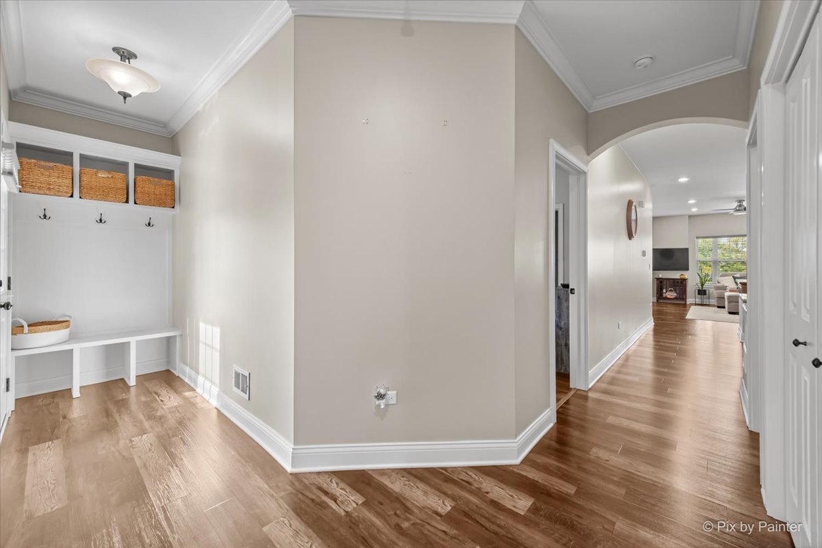 745 Harper Avenue Cary, IL 60013 - Photo 5 of 32 wooden floor in an empty room with a window