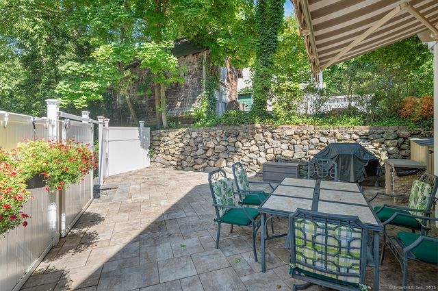 a view of outdoor sitting area with furniture