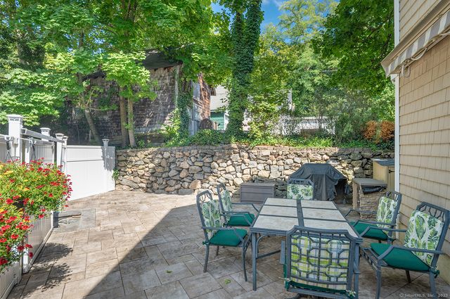 a view of yard with patio