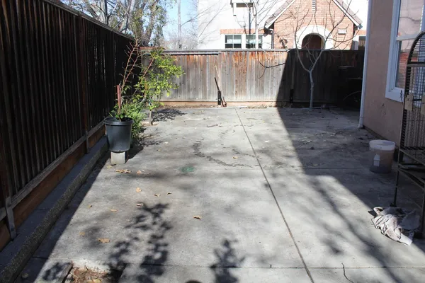 a view of a pathway besides a building