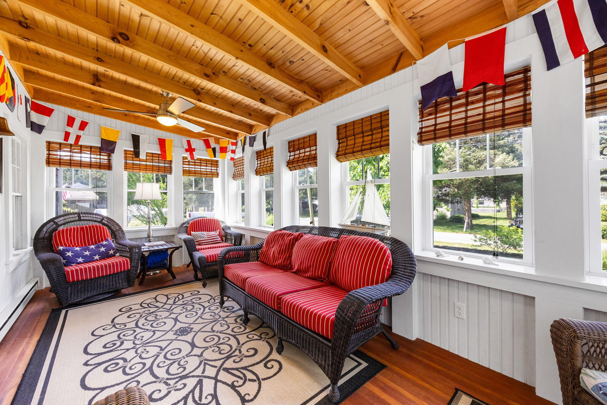 34 Kenwood Road Pocasset, MA 02559 - Photo 13 of 95 a living room with furniture a flat screen tv and windows