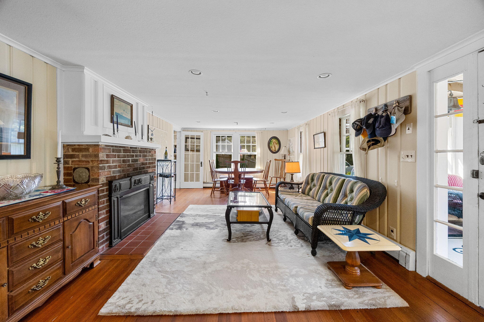 34 Kenwood Road Pocasset, MA 02559 - Photo 24 of 95 a living room with furniture and a fireplace