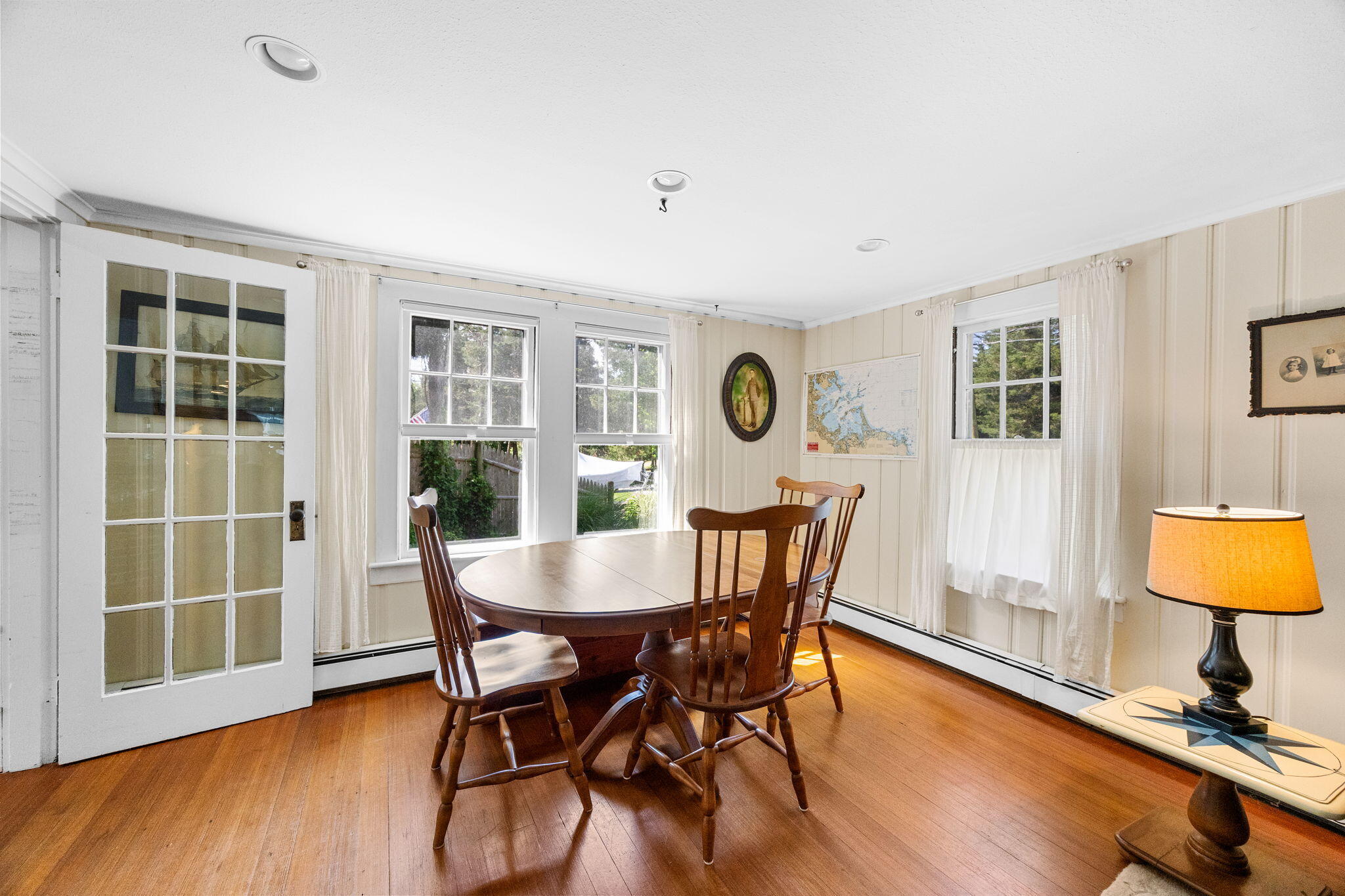 34 Kenwood Road Pocasset, MA 02559 - Photo 33 of 95 a view of a dining room with furniture and wooden floor