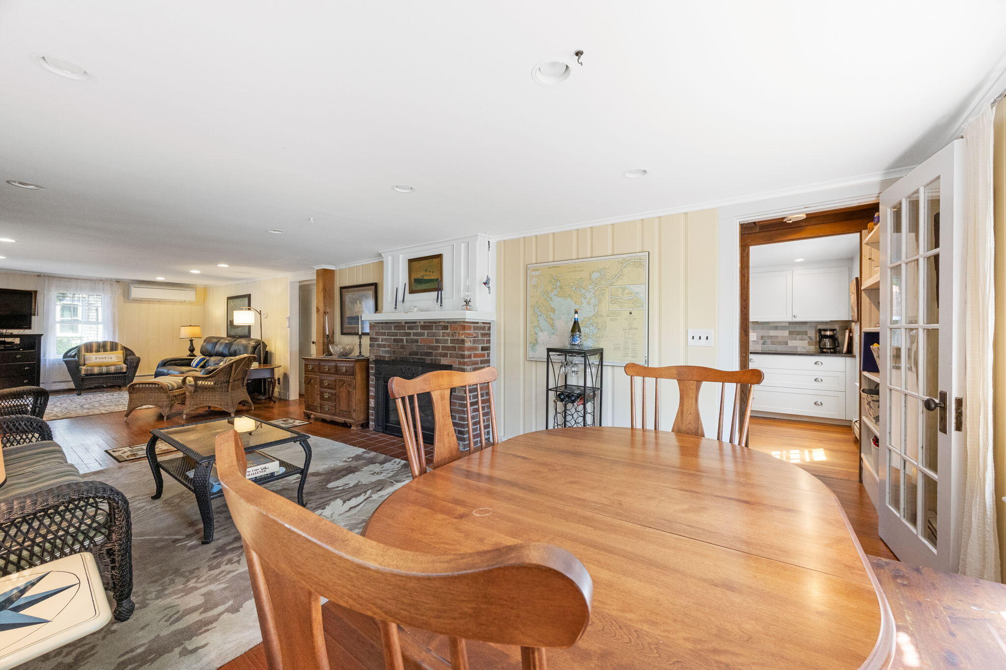 34 Kenwood Road Pocasset, MA 02559 - Photo 35 of 95 a living room with fireplace furniture and a table