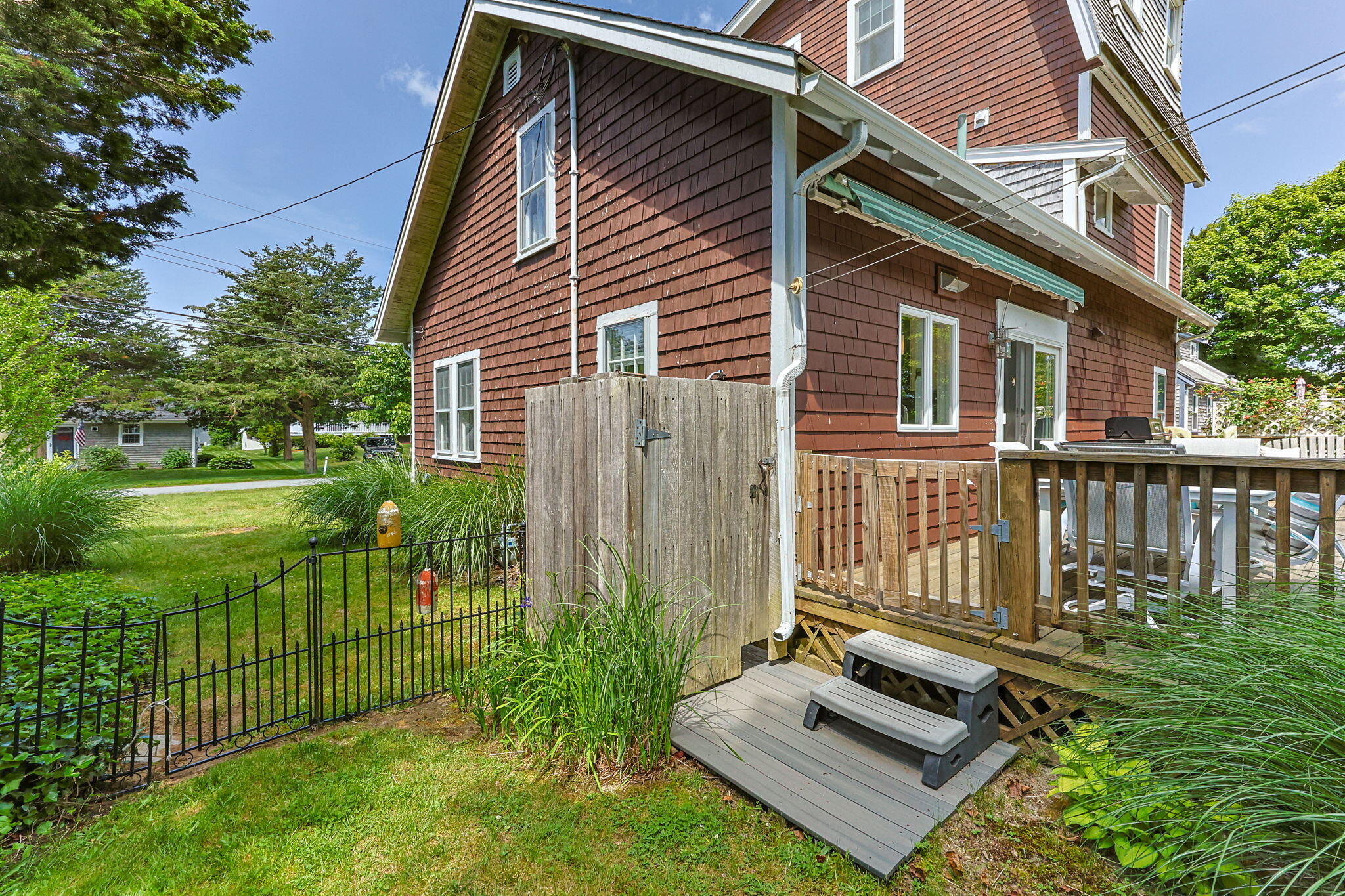 34 Kenwood Road Pocasset, MA 02559 - Photo 63 of 95 a view of a house with a yard