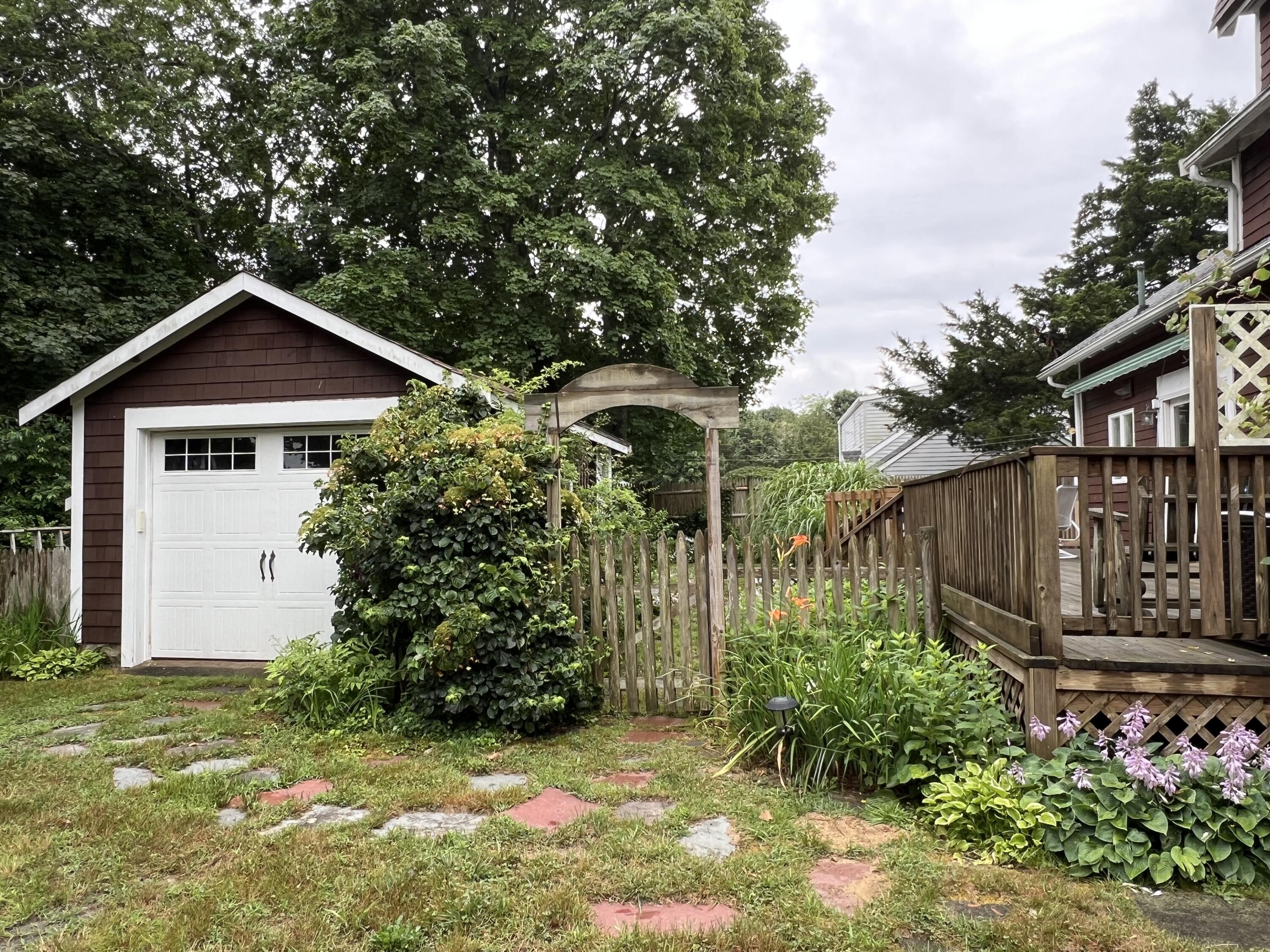 34 Kenwood Road Pocasset, MA 02559 - Photo 78 of 95 a front view of house with garden