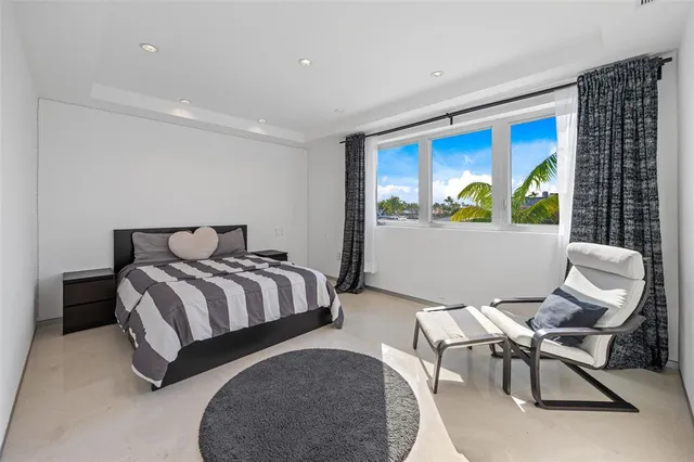 a bathroom with a double vanity sink mirror and shower