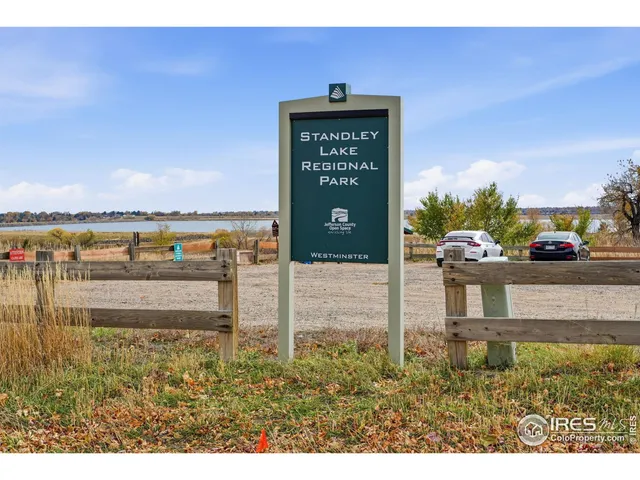 a sign board with an ocean view