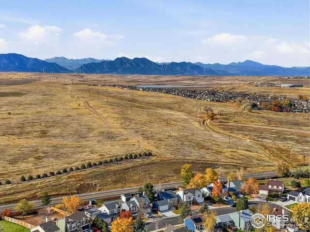 a view of an ocean and a mountain