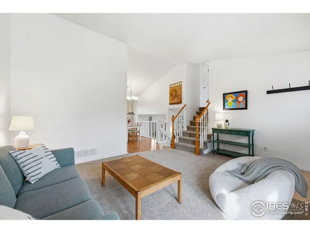 a living room with furniture and a couch