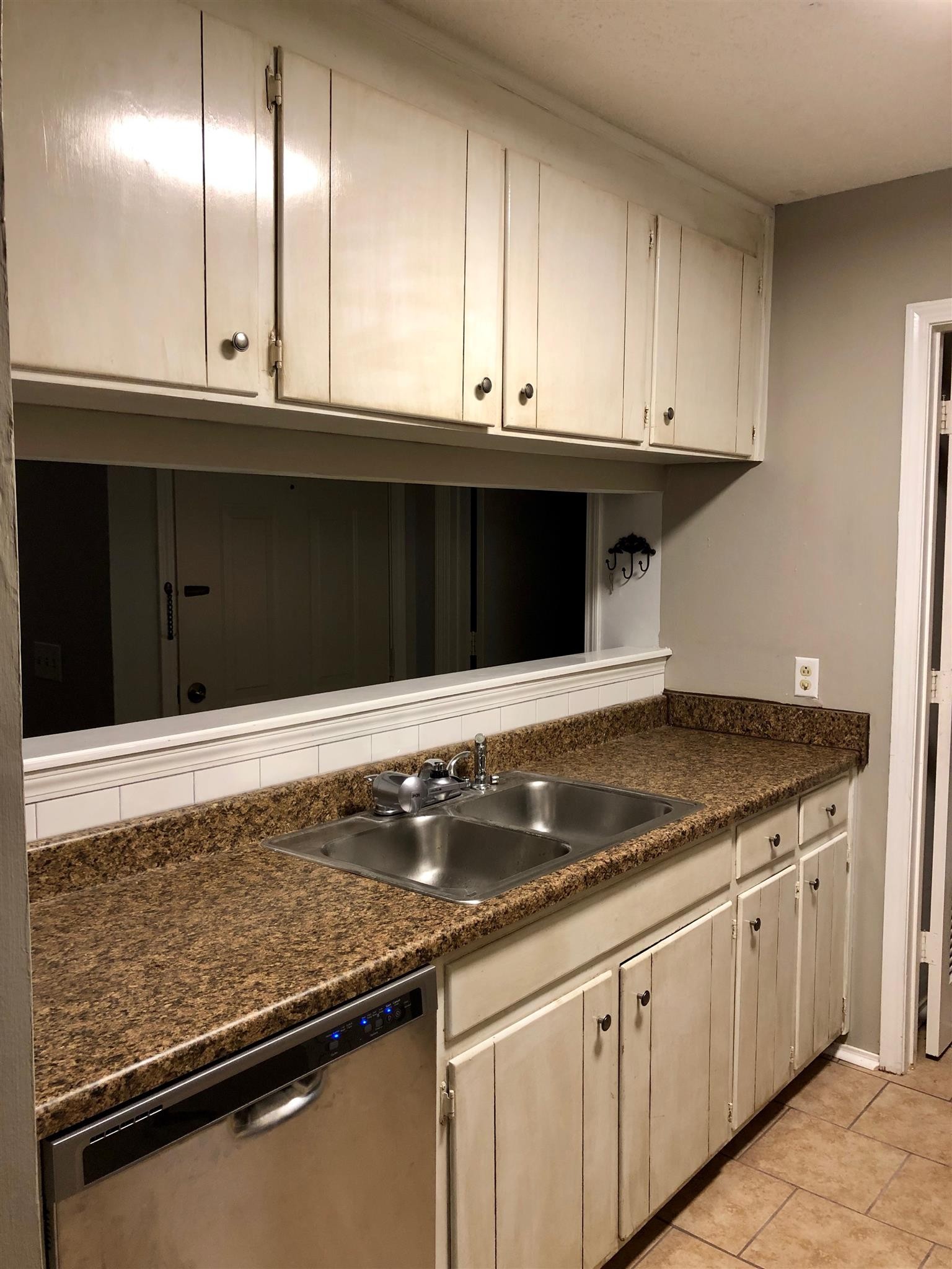 4316 Baton Rouge Drive Hermitage, TN 37076 - Photo 3 of 10 a kitchen with granite countertop a sink and white cabinets