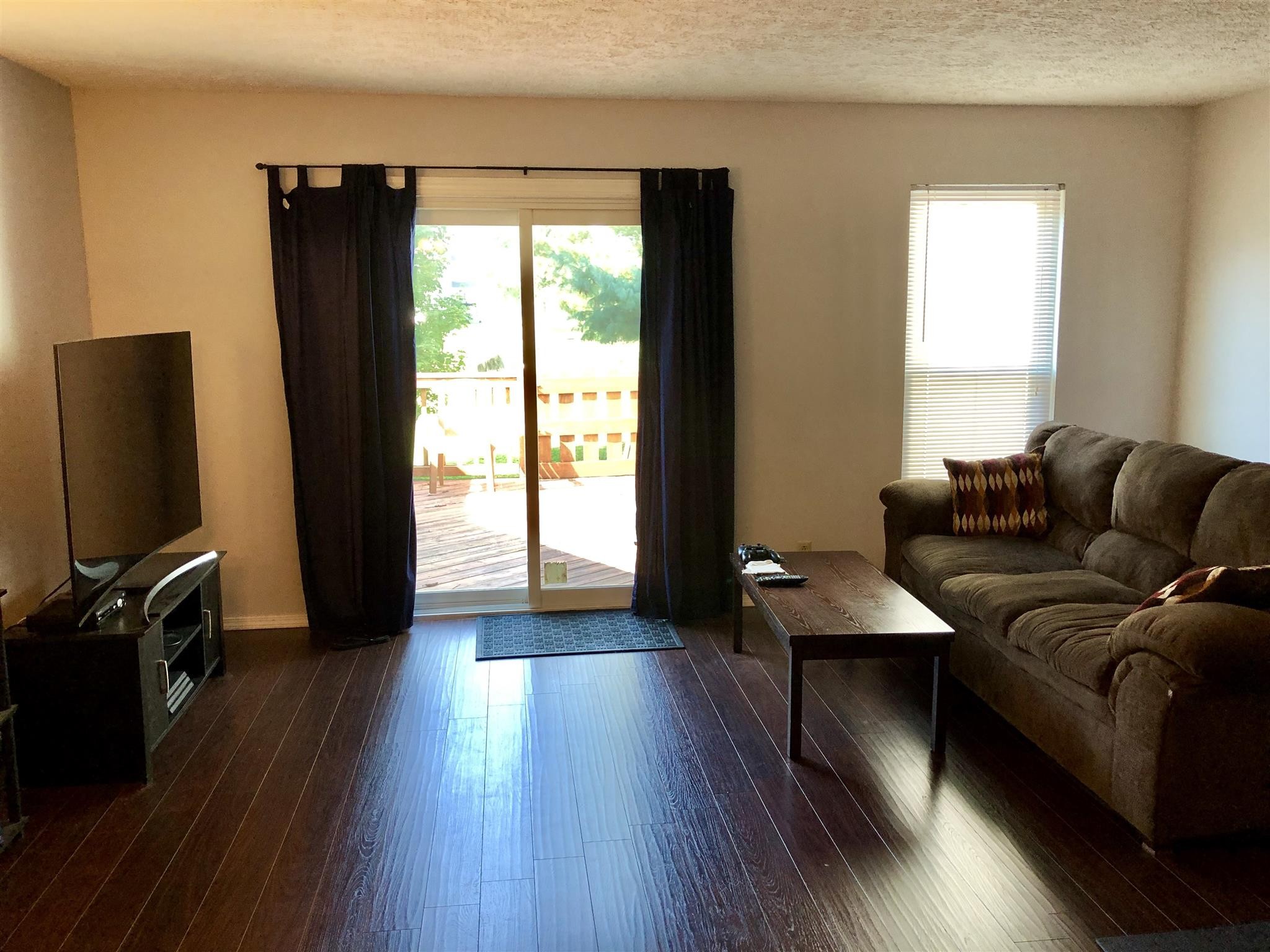 4316 Baton Rouge Drive Hermitage, TN 37076 - Photo 6 of 10 a living room with furniture and a flat screen tv