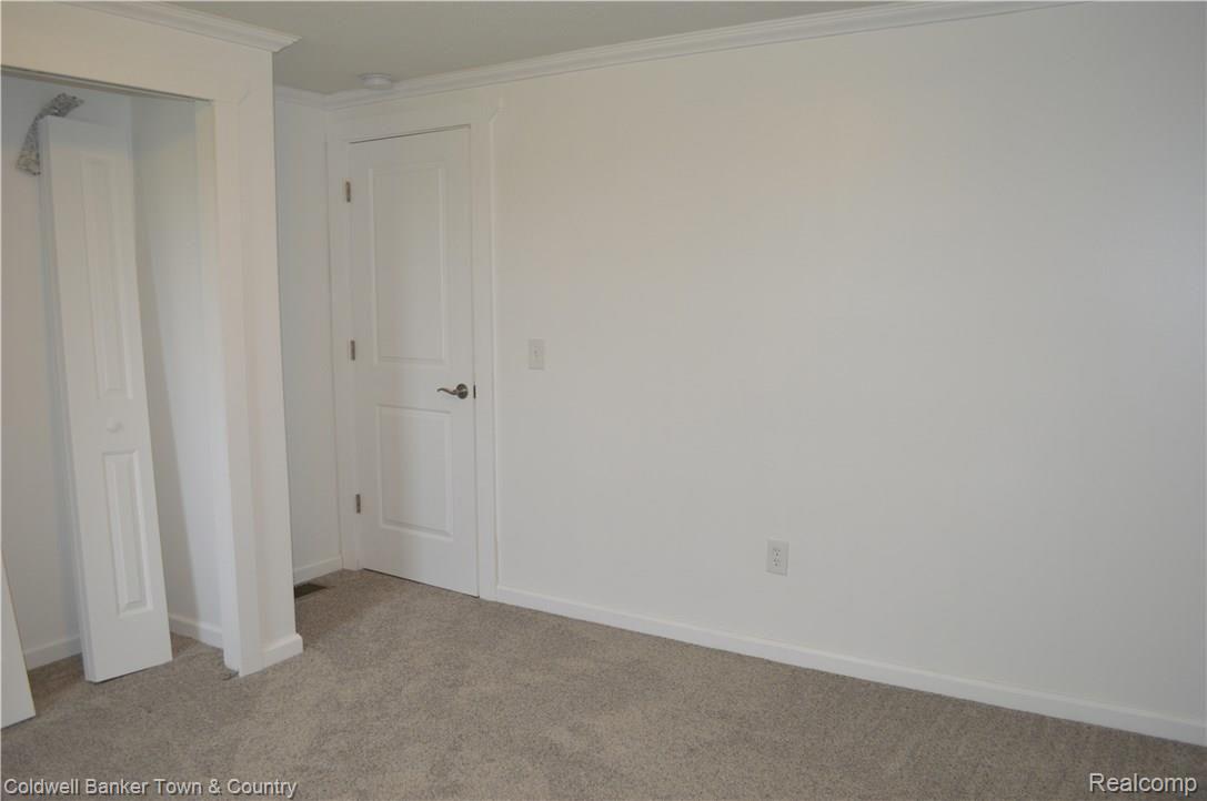 4439 Swan Road Stockbridge, MI 49285 - Photo 16 of 26 Master Bedroom showing bedroom door.