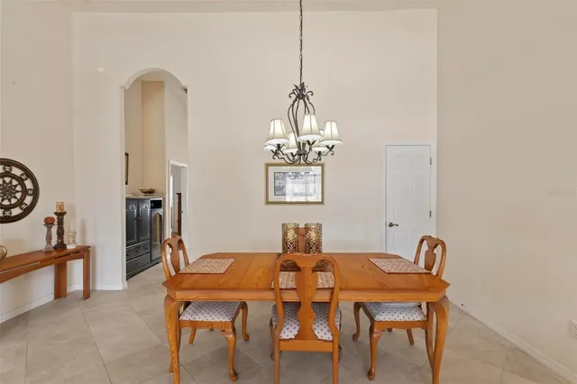 a living room with lots of furniture and a window