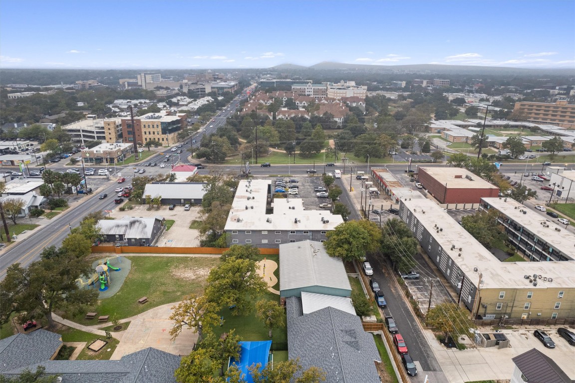 3815 Guadalupe Street, Unit 204 Austin, TX 78751 - Photo 19 of 19 an aerial view of residential houses with outdoor space