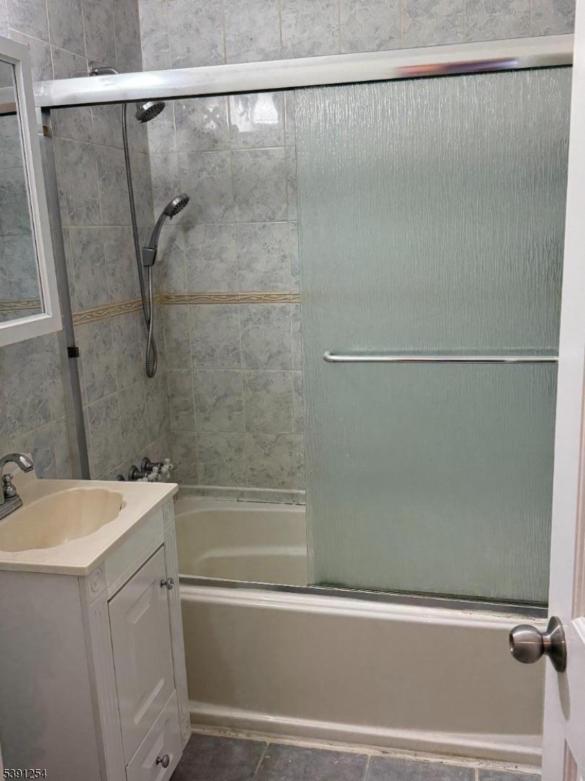 799 Mountain Avenue, Unit D Springfield, NJ 07081 - Photo 16 of 16 a bathroom with a shower and a sink