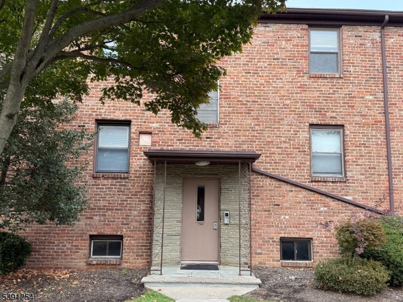 799 Mountain Avenue, Unit D Springfield, NJ 07081 - Photo 2 of 16 a front view of a house with stairs