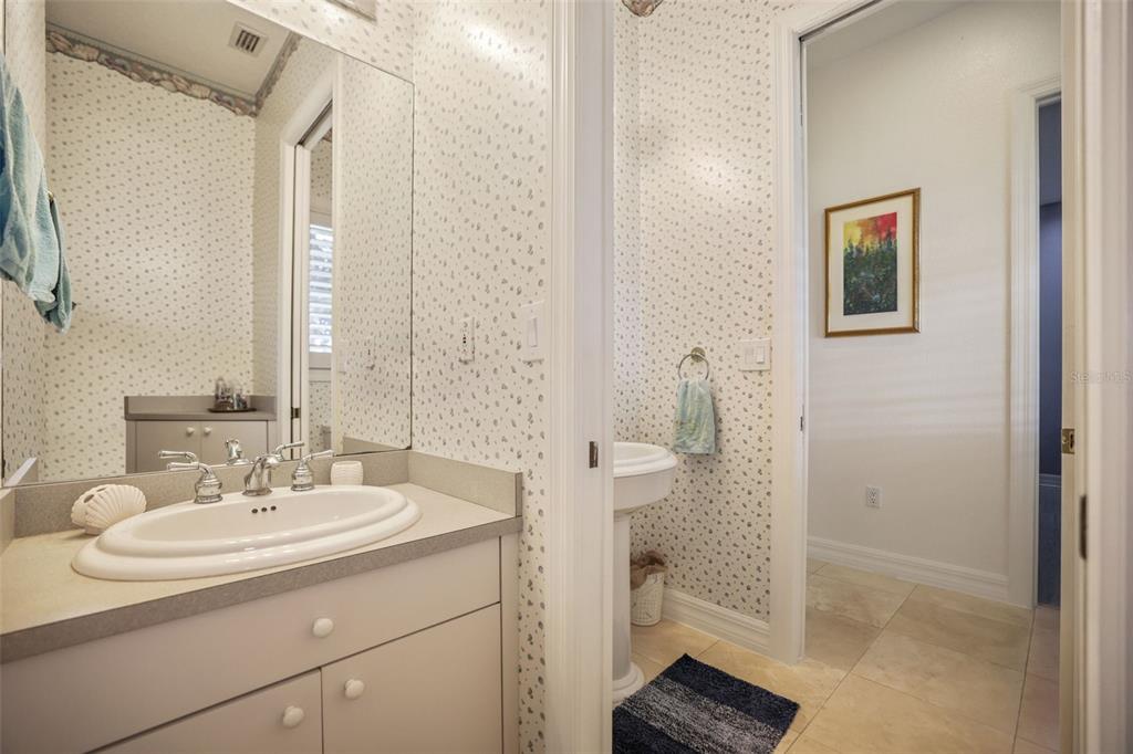 14423 Kandi Court Largo, FL 33774 - Photo 39 of 75 a bathroom with a sink a toilet and shower