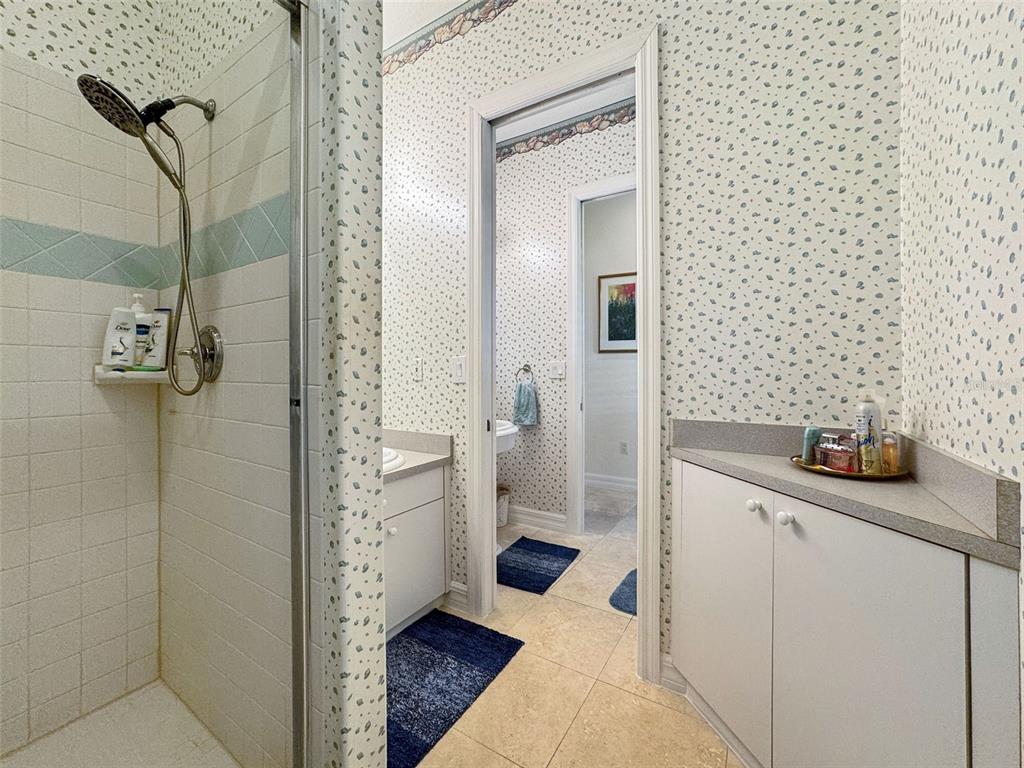 14423 Kandi Court Largo, FL 33774 - Photo 41 of 75 a bathroom with a sink a toilet and shower