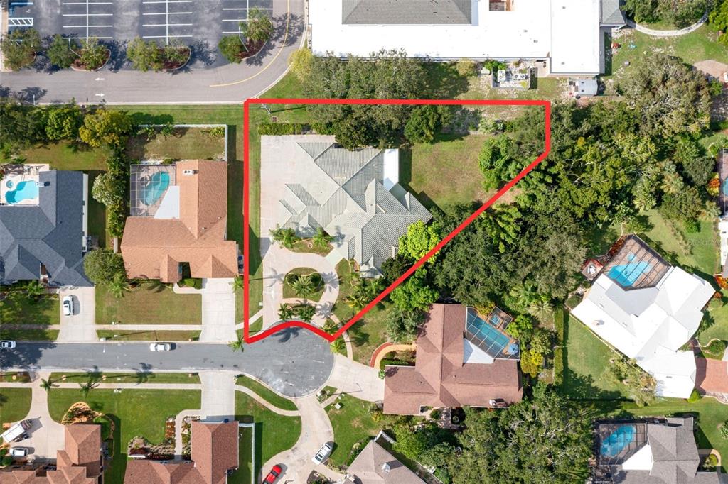 14423 Kandi Court Largo, FL 33774 - Photo 62 of 75 an aerial view of a houses with outdoor space and street view