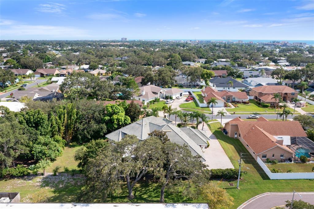 14423 Kandi Court Largo, FL 33774 - Photo 71 of 75 an aerial view of a city with lots of residential buildings lake and ocean view