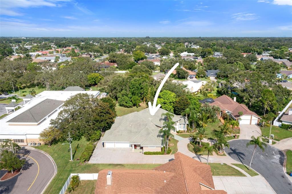 14423 Kandi Court Largo, FL 33774 - Photo 72 of 75 an aerial view of residential houses with outdoor space and trees