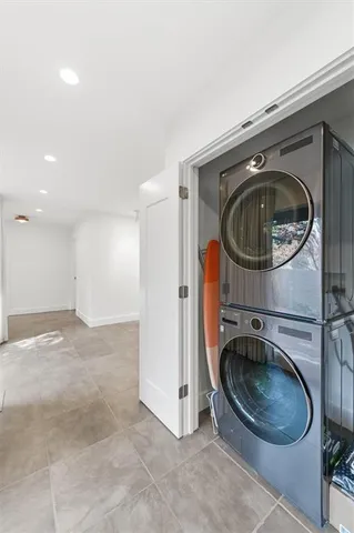 a living room with a couch and a chair