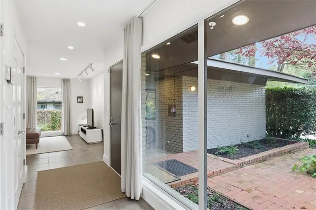 a backyard of a house with lots of green space