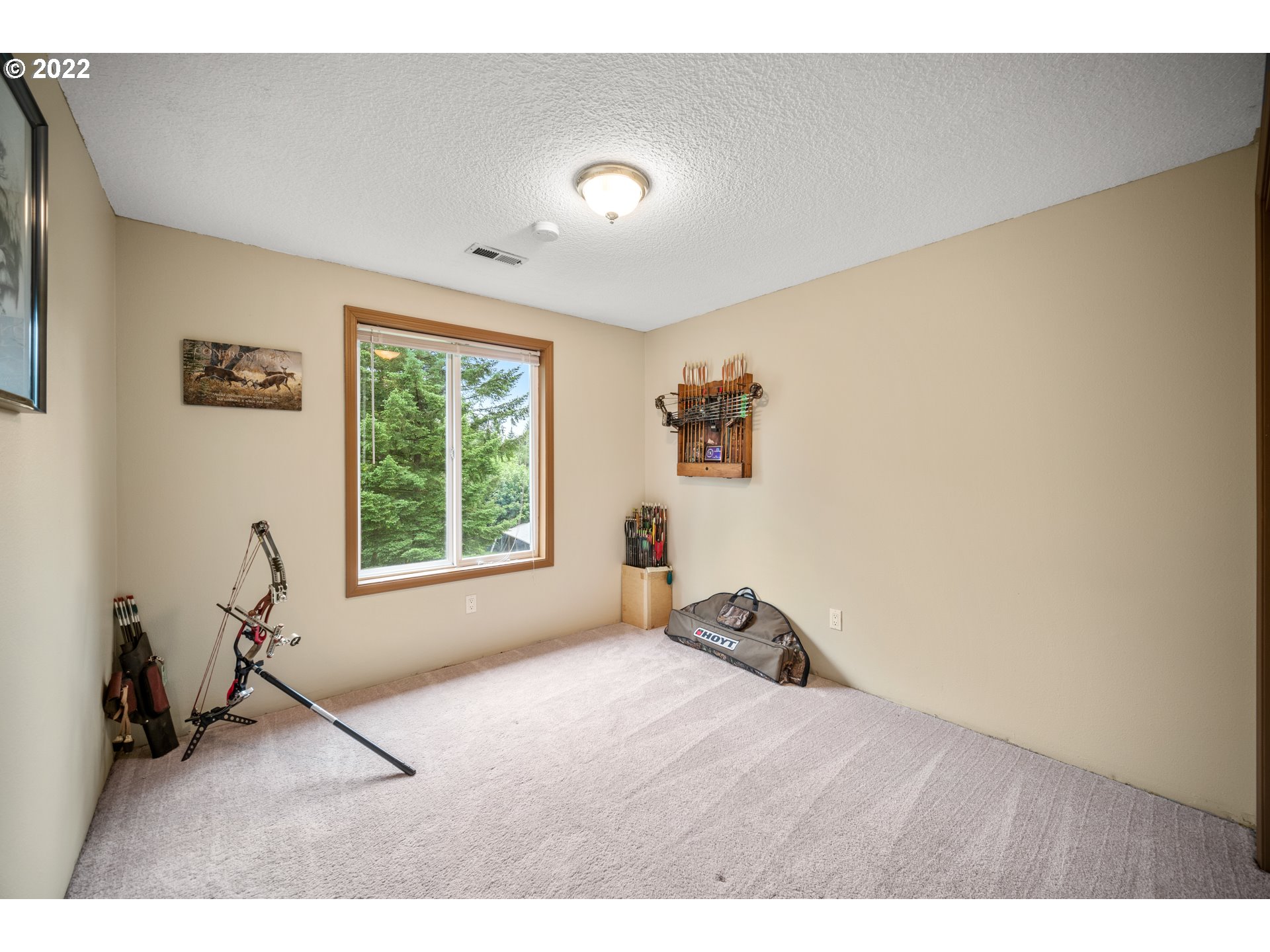 16207 Northeast Beebe Road Battle Ground, WA 98604 - Photo 19 of 32 a room with gym equipment and a large window