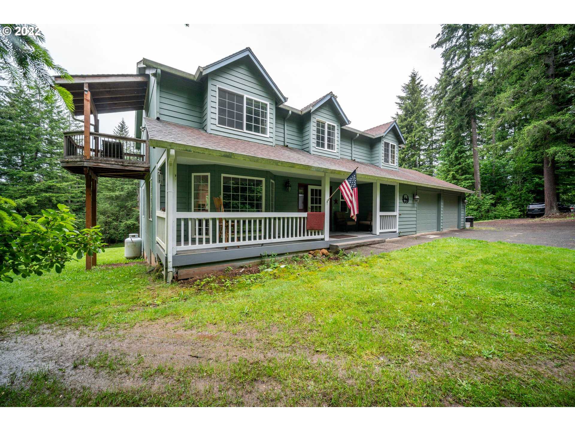 16207 Northeast Beebe Road Battle Ground, WA 98604 - Photo 24 of 32 a view of a house with a yard and deck