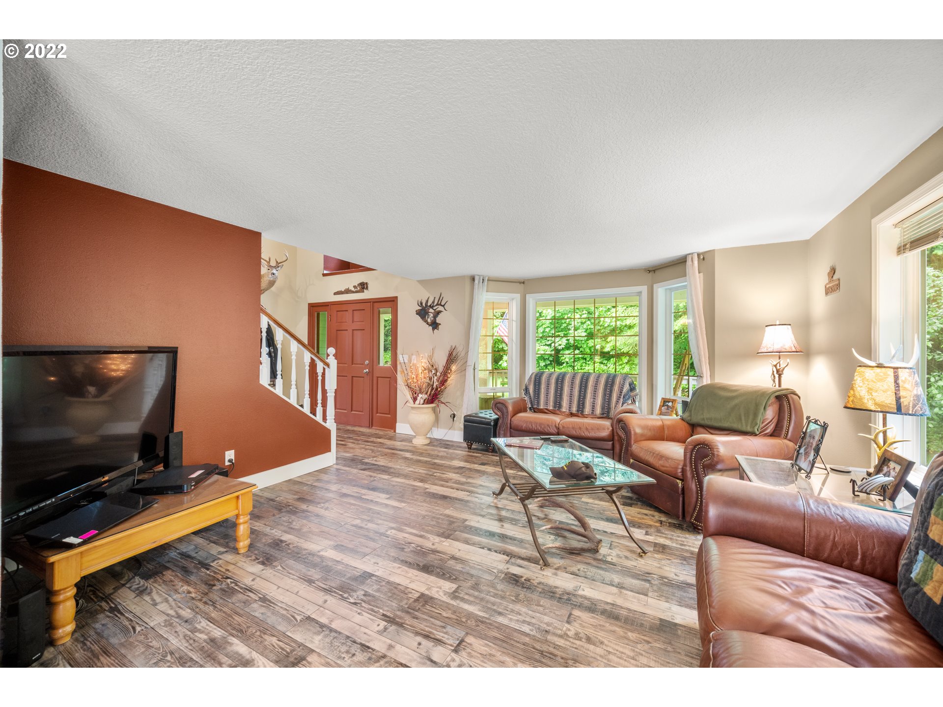 16207 Northeast Beebe Road Battle Ground, WA 98604 - Photo 7 of 32 a living room with furniture and a flat screen tv