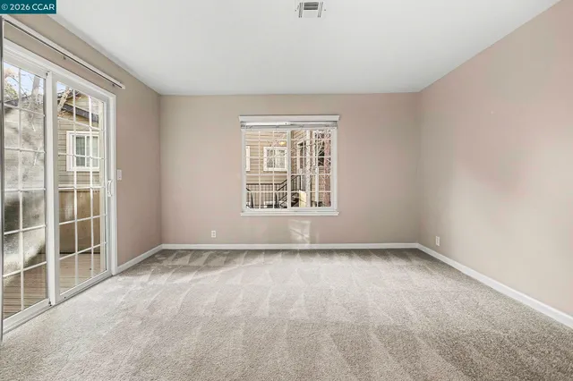 an empty room with windows