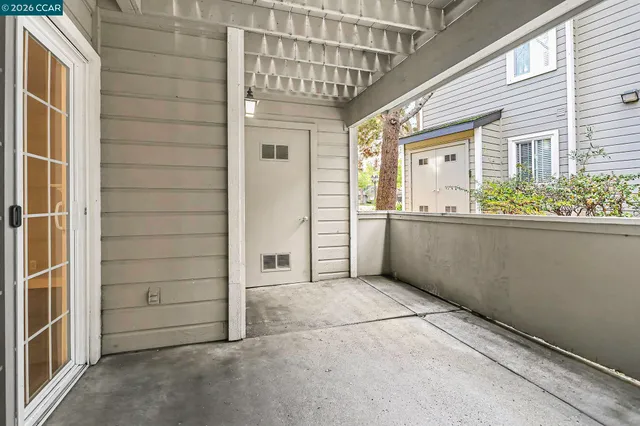 front view of a house with a large window