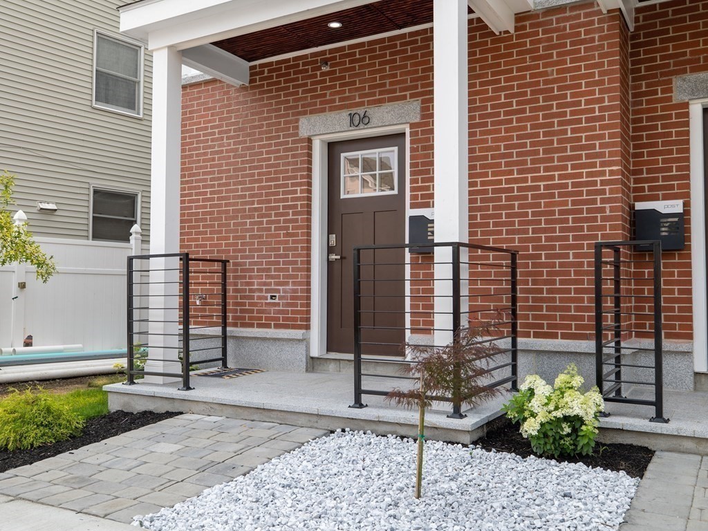 106-116 Main Street Everett, MA 02149 - Photo 2 of 24 a front view of a house