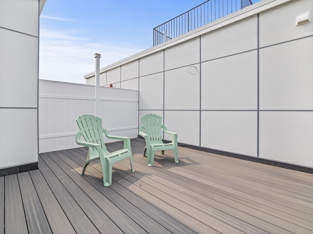 106-116 Main Street Everett, MA 02149 - Photo 23 of 24 a house view with a seating space