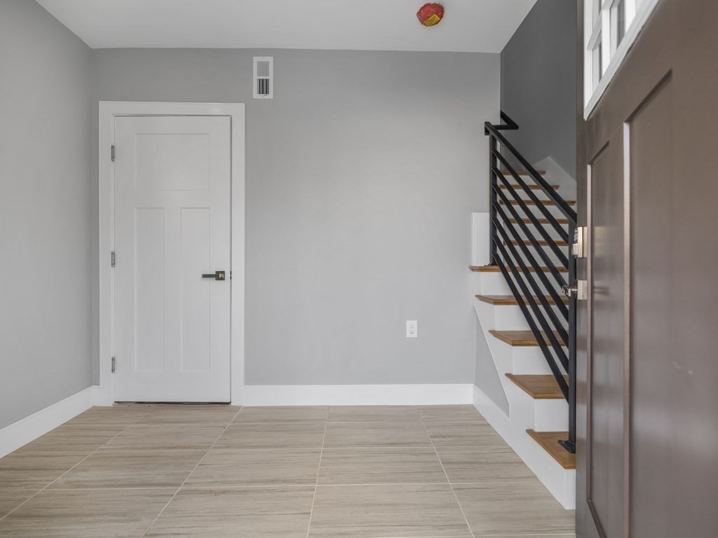 106-116 Main Street Everett, MA 02149 - Photo 5 of 24 a view of an entryway with wooden floor