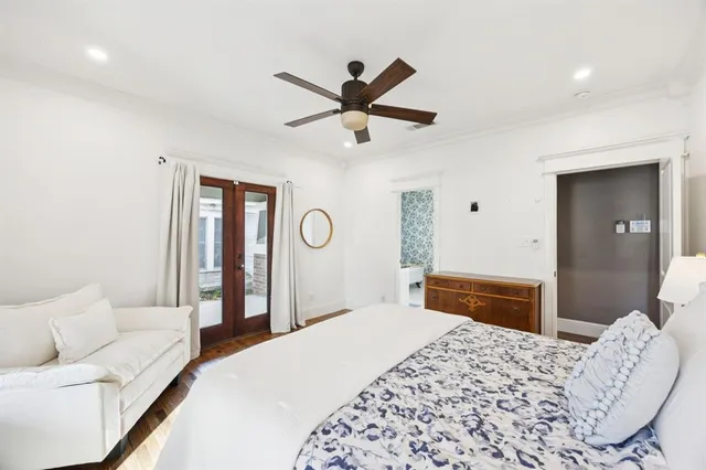 a bedroom with a bed and a dresser