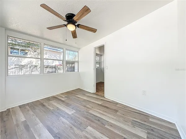 a view of a house with a yard and garage