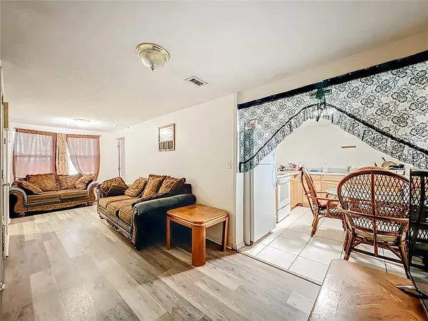 a view of a chairs and table in patio