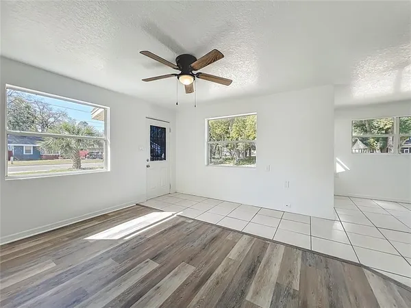a view of an empty room and window