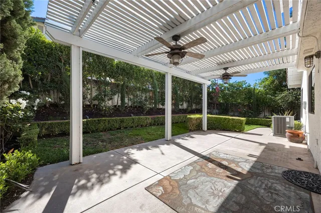 a view of a patio with a backyard