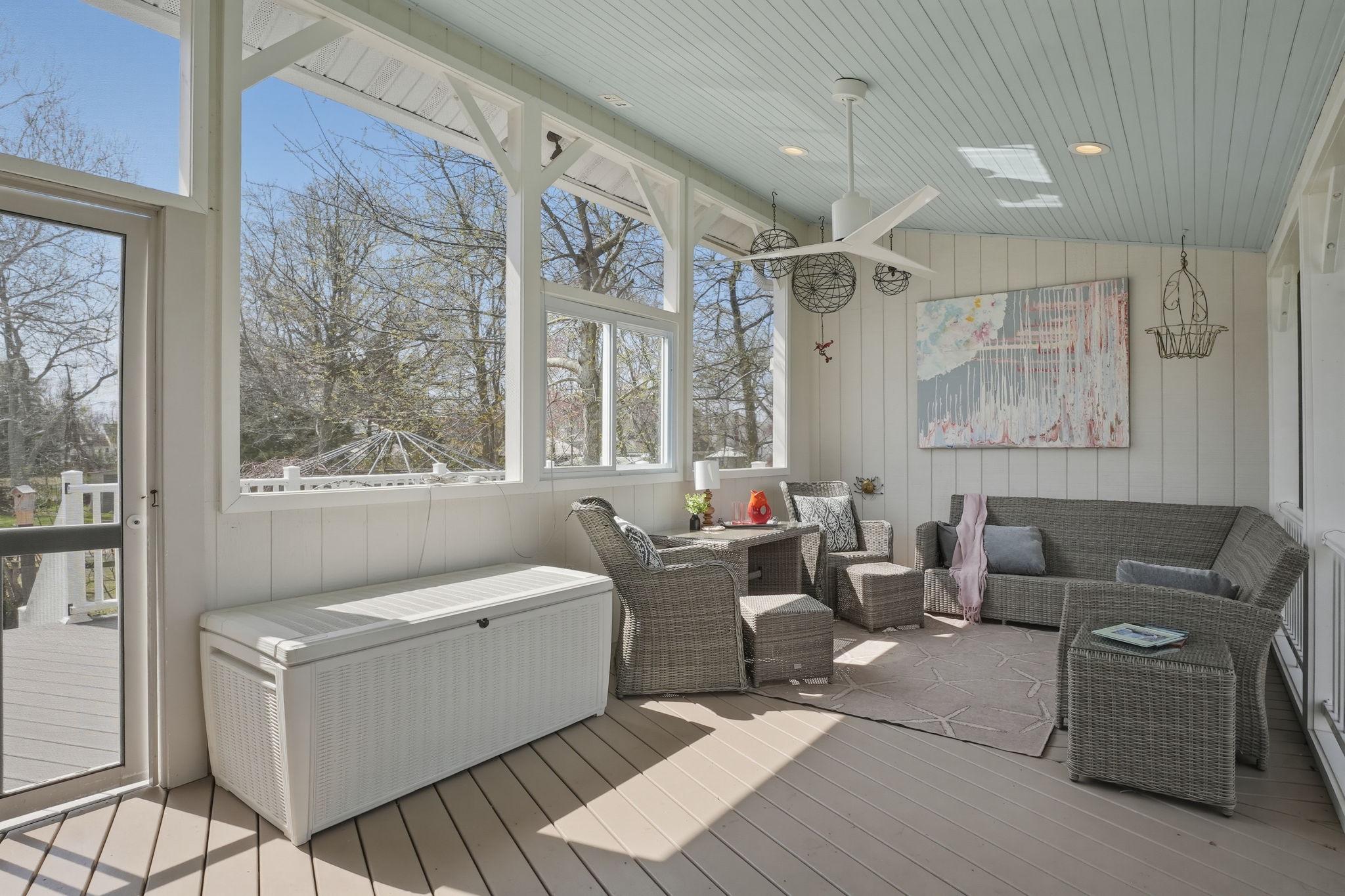 7806 Summit Drive Pasadena, MD 21122 - Photo 36 of 74 a living room with furniture and a large window